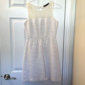 White A-line dress with lace detail